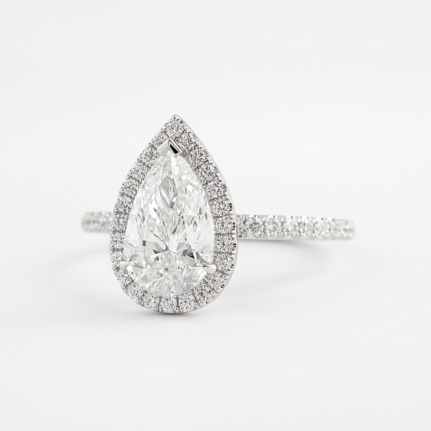 1.5 CT Pear Cut Halo Style Moissanite Engagement Ring