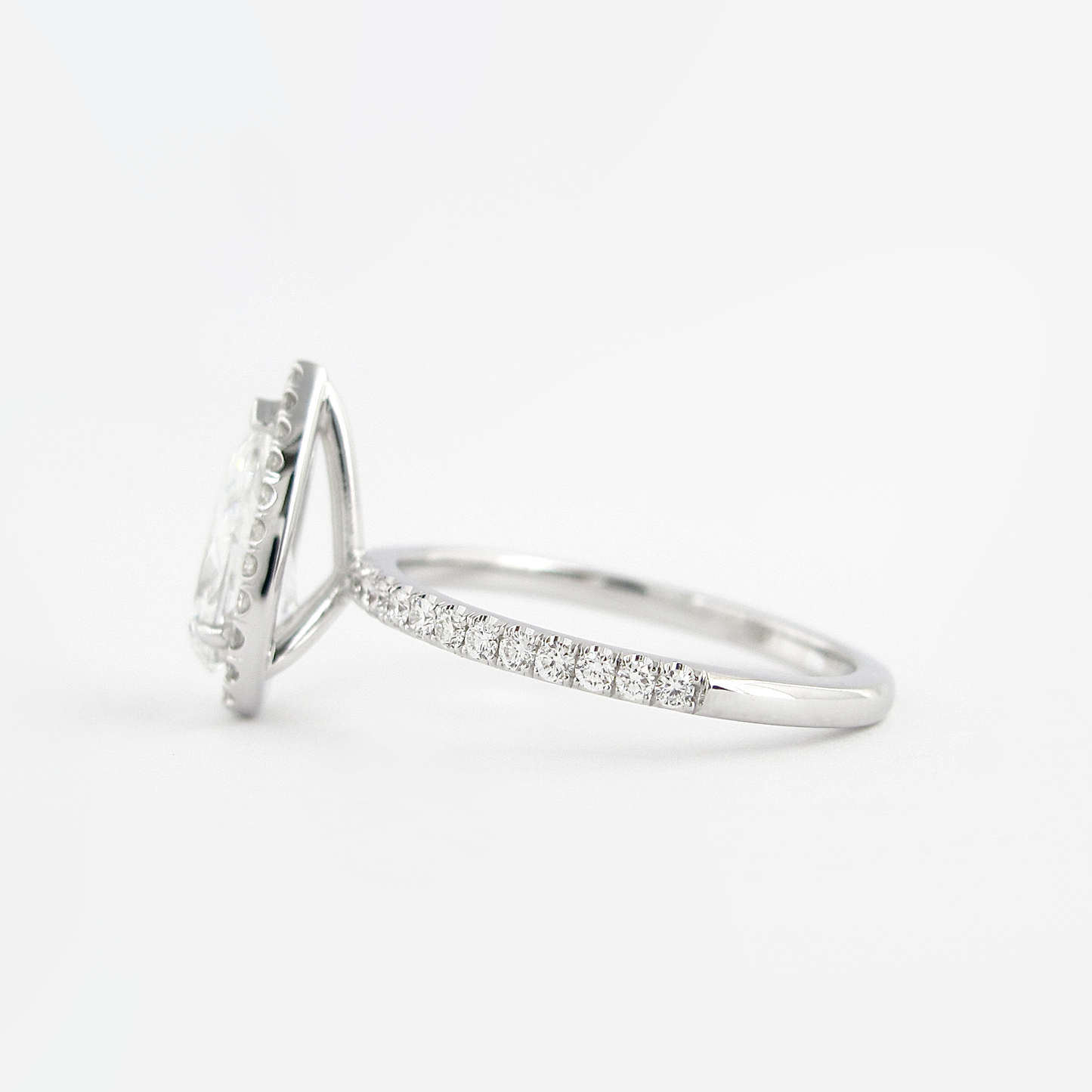 1.5 CT Pear Cut Halo Style Moissanite Engagement Ring