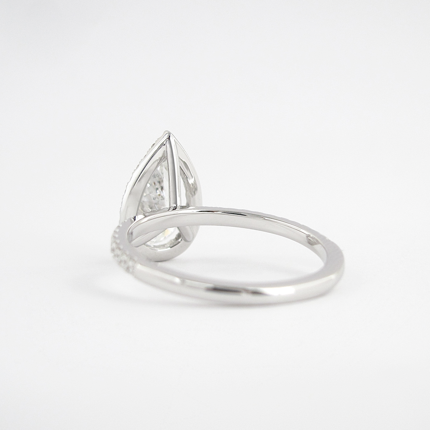 1.5 CT Pear Cut Halo Style Moissanite Engagement Ring