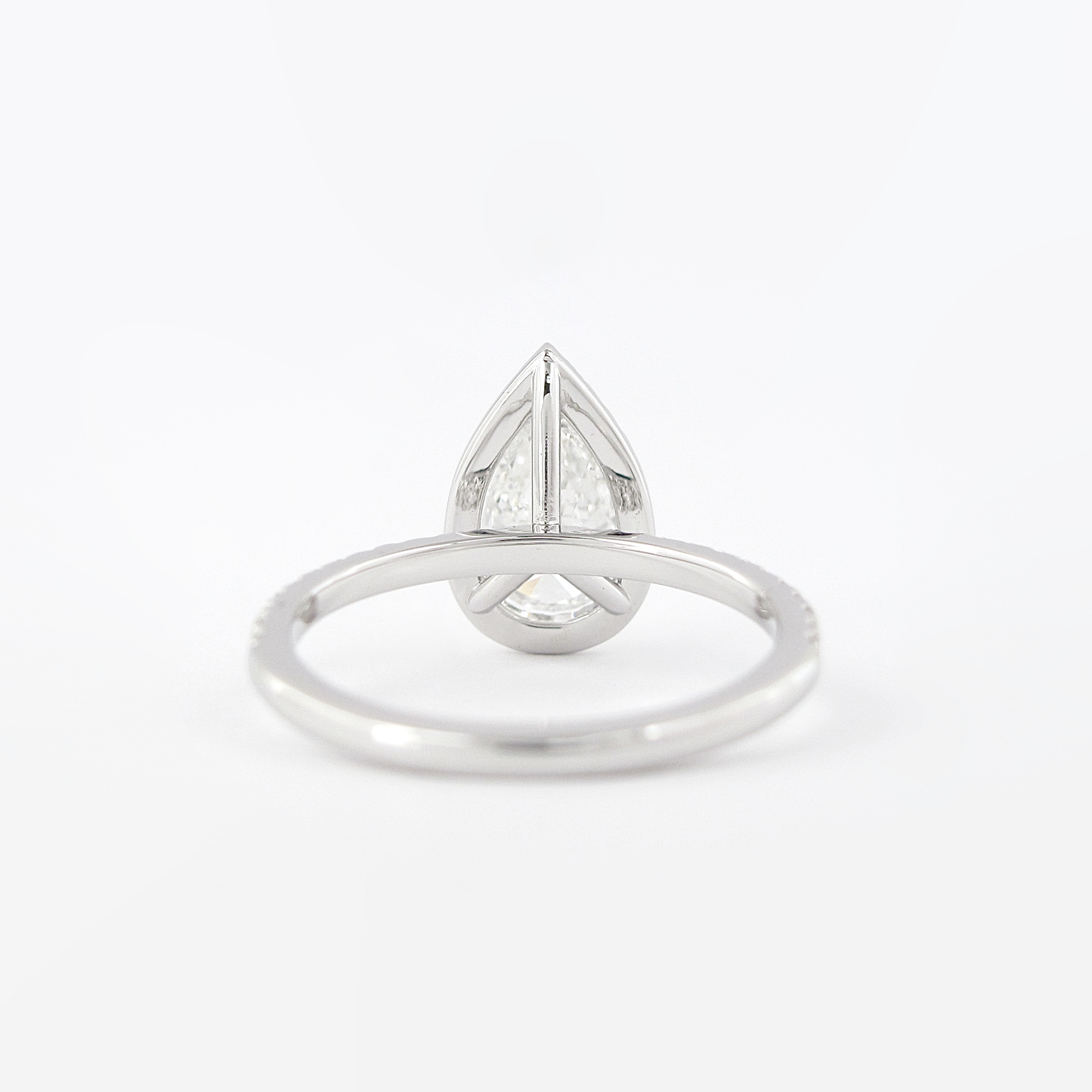 1.5 CT Pear Cut Halo Style Moissanite Engagement Ring