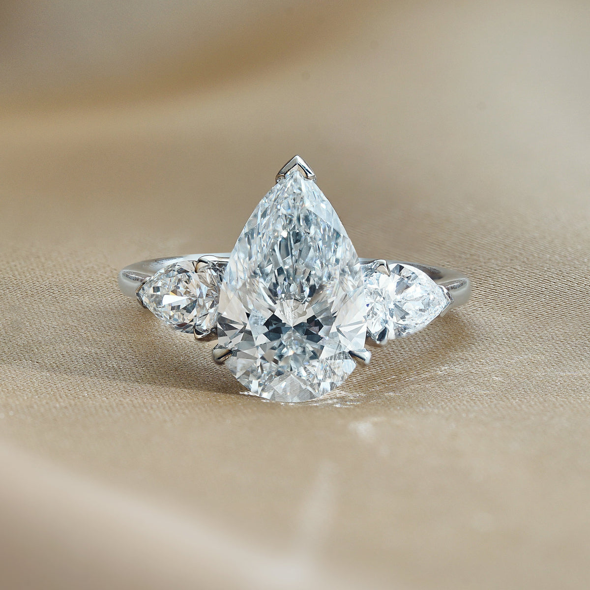 3.07 CT Pear Three Stone Moissanite Engagement Ring