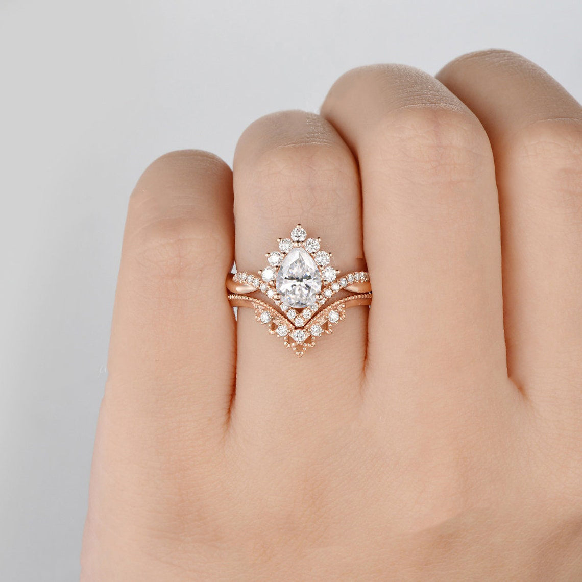 1.50 CT Pear Cut Cluster Twisted Moissanite Bridal Ring Set