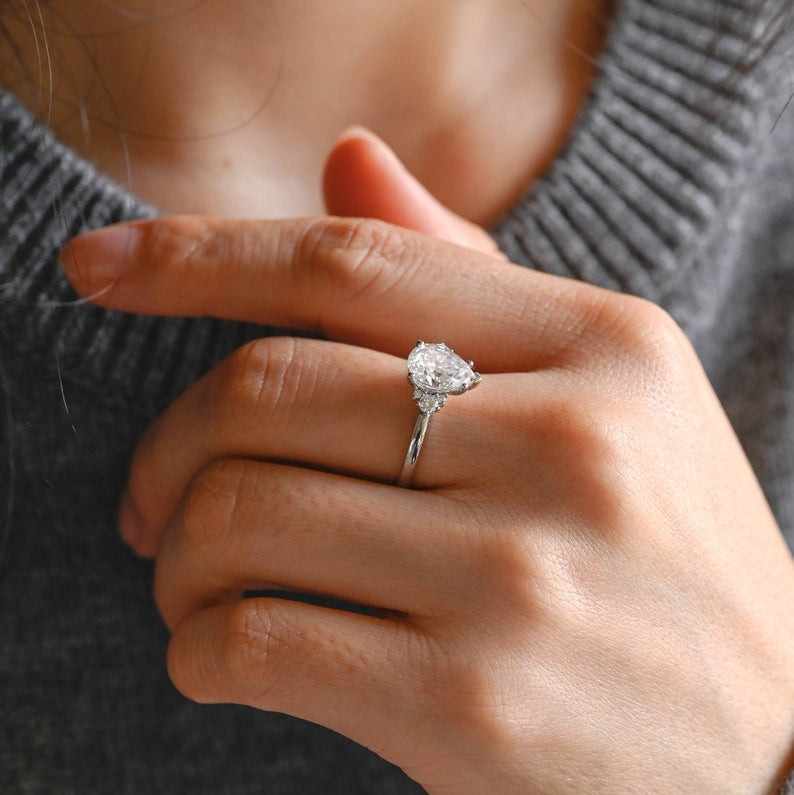 Stunning 1.0 - 2.0 CT Pear Moissanite Engagement Ring with Cluster Design 4