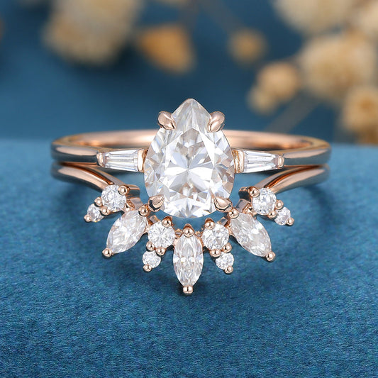 1.0 CT Pear Shaped Moissanite Three Stone Bridal Set