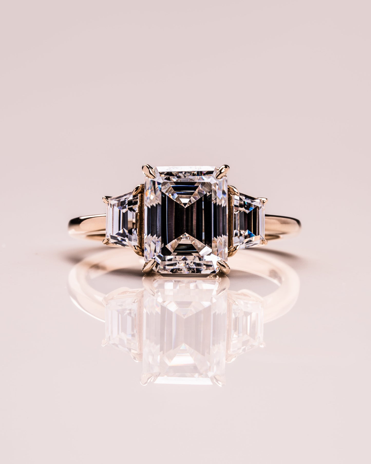 0.66 CT Emerald Cut Three Stone Moissanite Engagement Ring