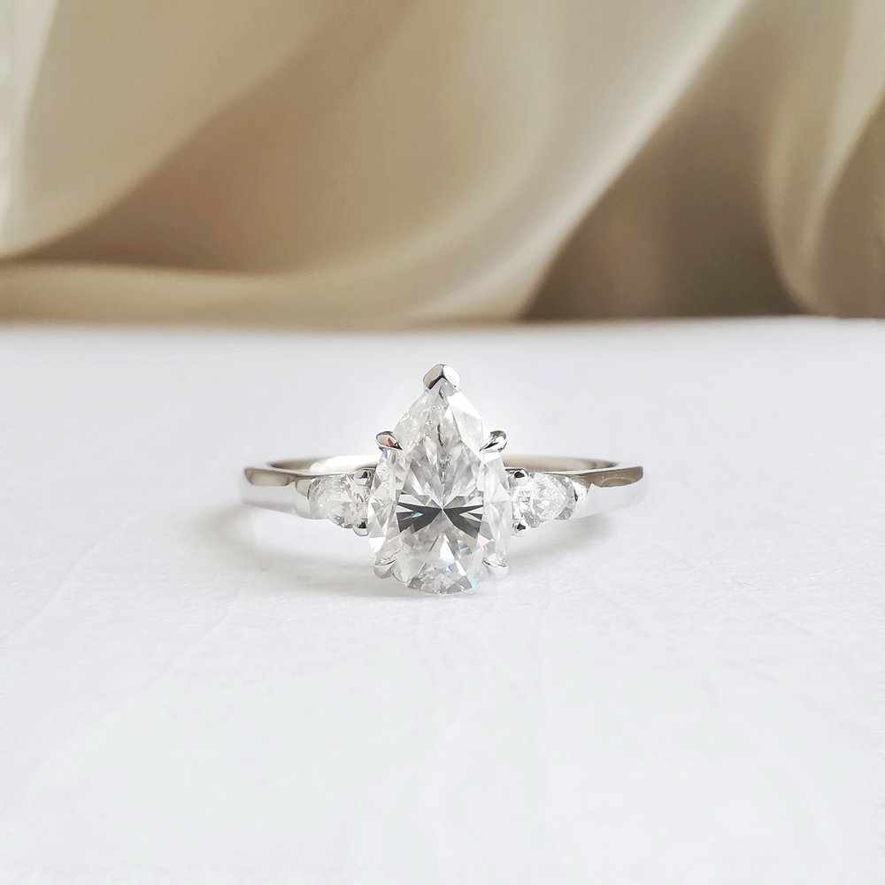 1.50 CT Pear Shaped Moissanite Three Stone Engagement Ring