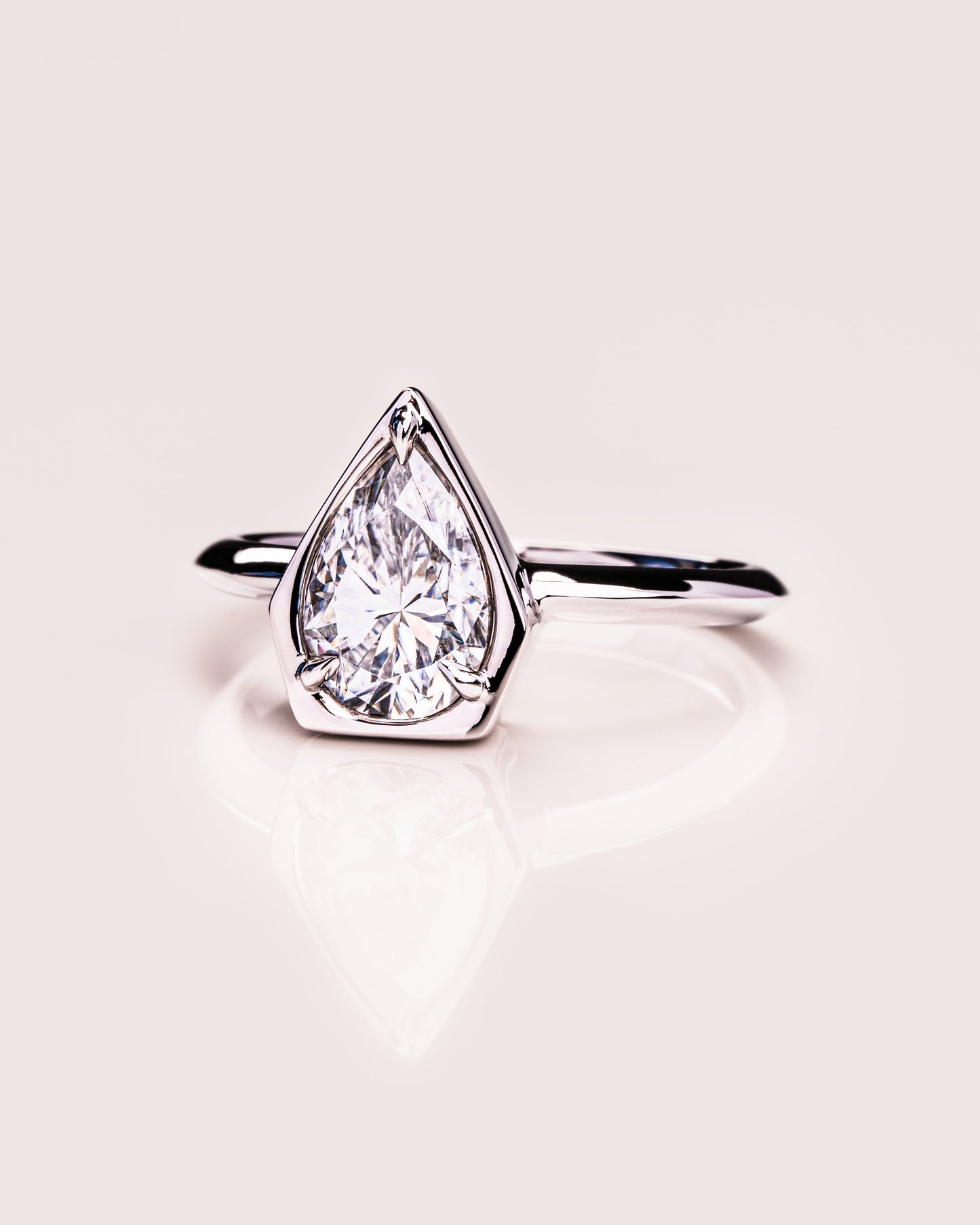 1.33 CT Pear Cut Bezel Solitaire Moissanite Engagement Ring