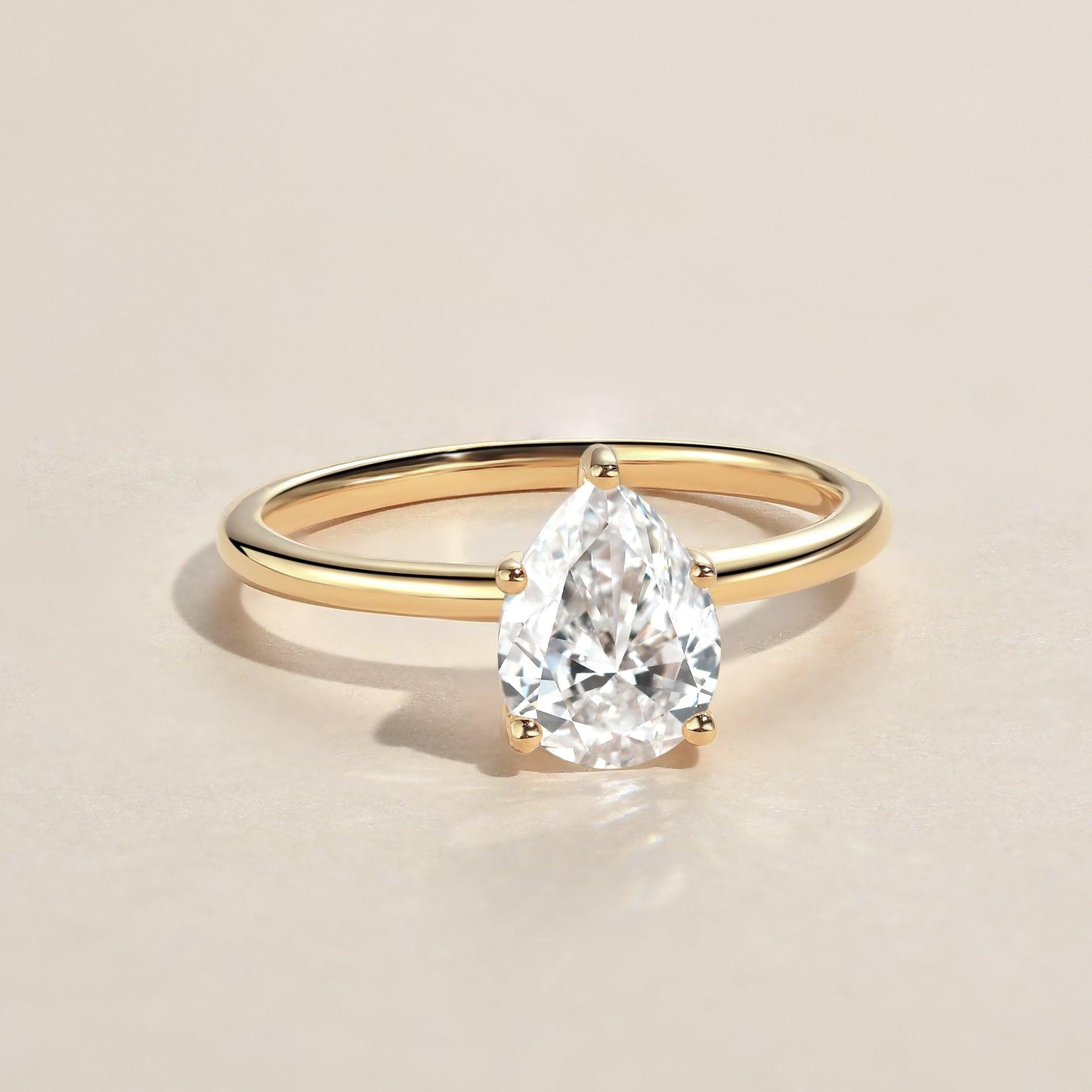 1.25 CT Pear Cut Solitaire Moissanite Engagement Ring