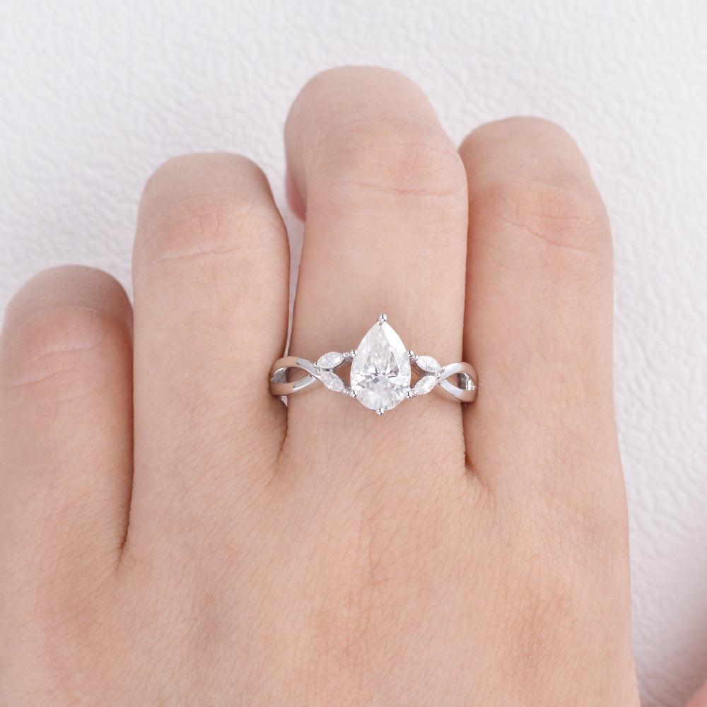 1.52 CT Pear Cut Twisted Moissanite Engagement Ring