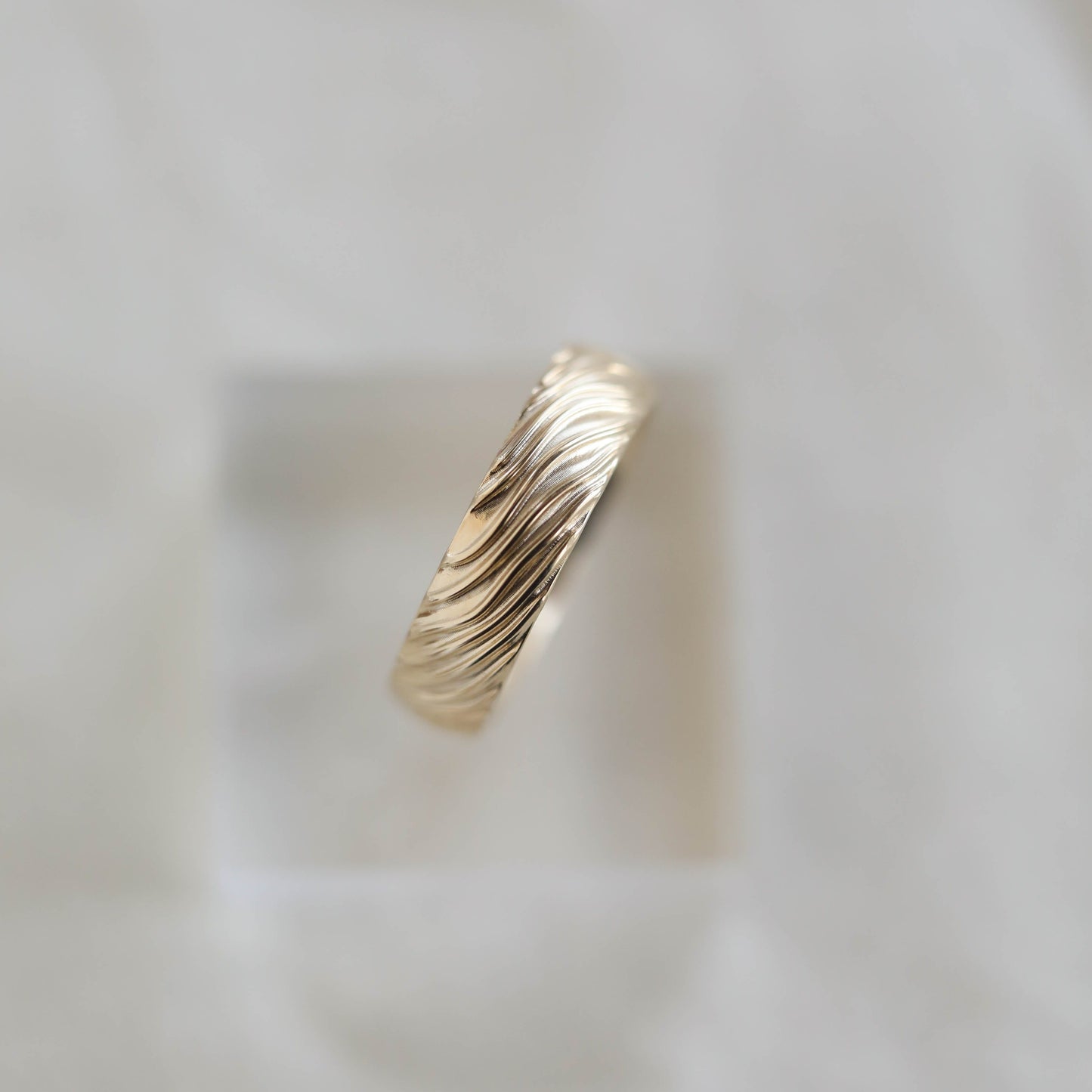 Yellow Gold Men's Wedding Band with wave like texture