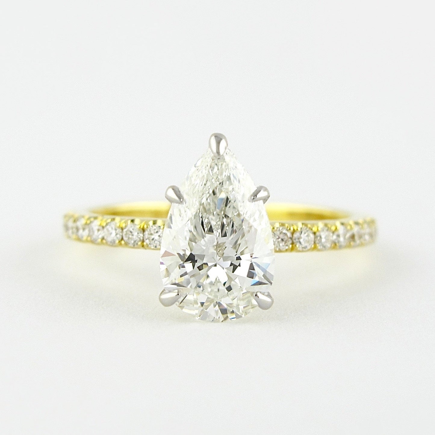 0.94 CT Pear Solitaire & Pave Setting Moissanite Engagement Ring