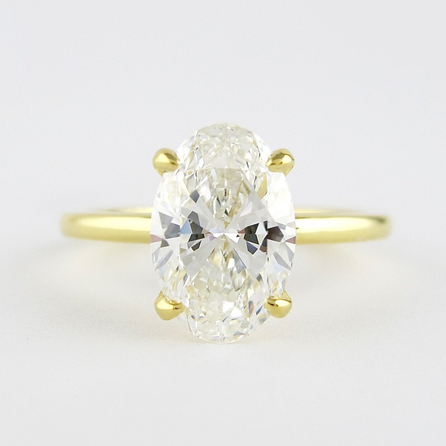 1.33 CT Oval Cut Solitaire Style Moissanite Engagement Ring