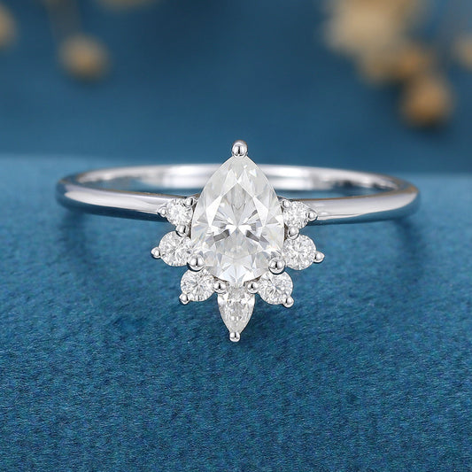 0.69 CT Pear Shaped Moissanite Cluster Engagement Ring