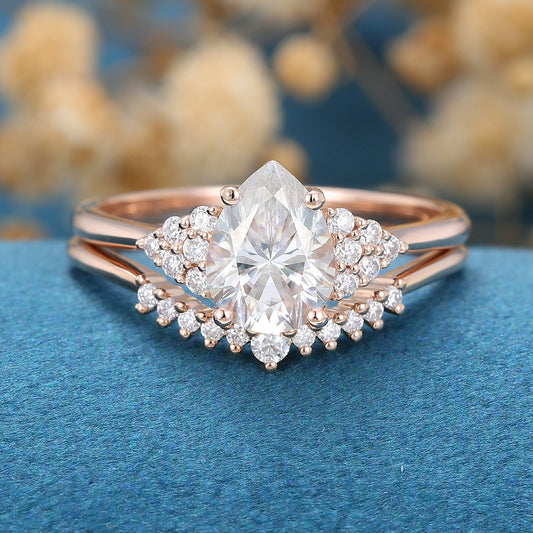 1.0 CT Pear Shaped Moissanite Cluster Bridal Set