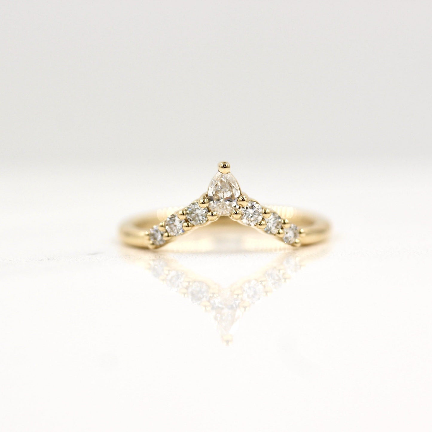 0.31 TCW Round & Pear Cut Curved Moissanite Wedding Band