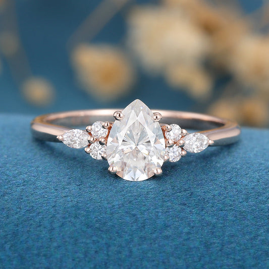 1.0 CT Pear Shaped Moissanite Cluster Engagement Ring